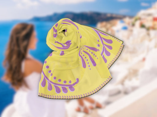 The butter yellow scarf wrapped as a shawl, highlighting its geometric design and soft fabric. This yellow summer scarf is perfect as a butter yellow wrap for vacation, resort wear, or as a breathable layer during warm evenings by the sea or poolside lounging.