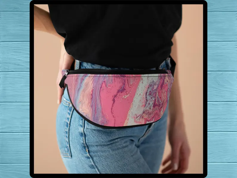 pink fashion belt pouch for women as a crossbody bag. The pink fanny pack features a bold abstract design and fits snugly with its adjustable strap, ideal for stylish hands-free wear during daily outings or travel.