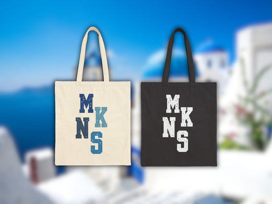 This image presents the Mykonos tote in both black and natural colors. Whether planning a bachelorette Mykonos weekend or searching for Mykonos gift ideas, these versatile bags are suitable for any style-conscious traveler or partygoer.