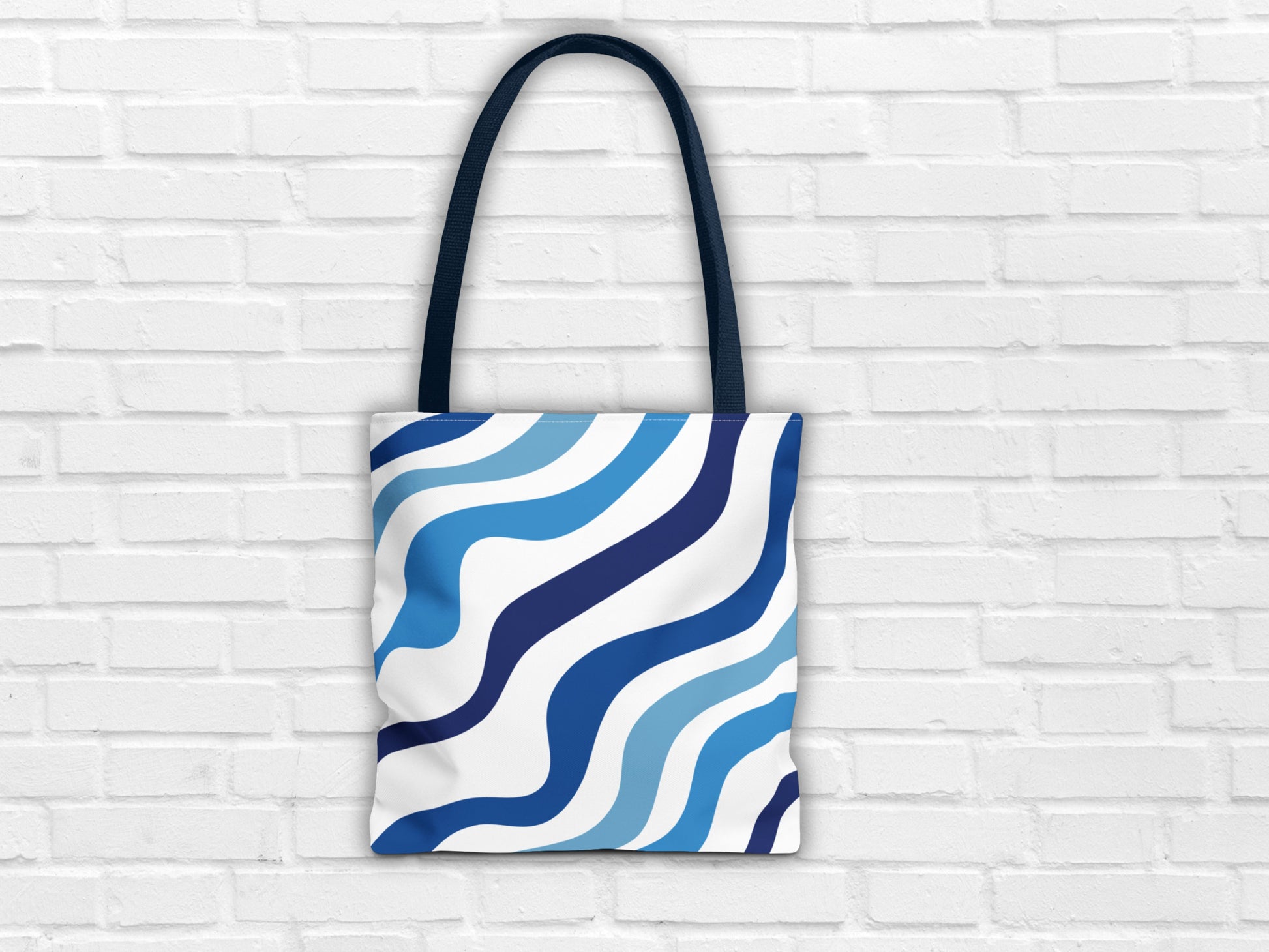Blue bag on a white background, a blue shoulder bag inspired by Greece. Summer vibes to make the ideal Santorini outfit designed by Sea Sun Stories