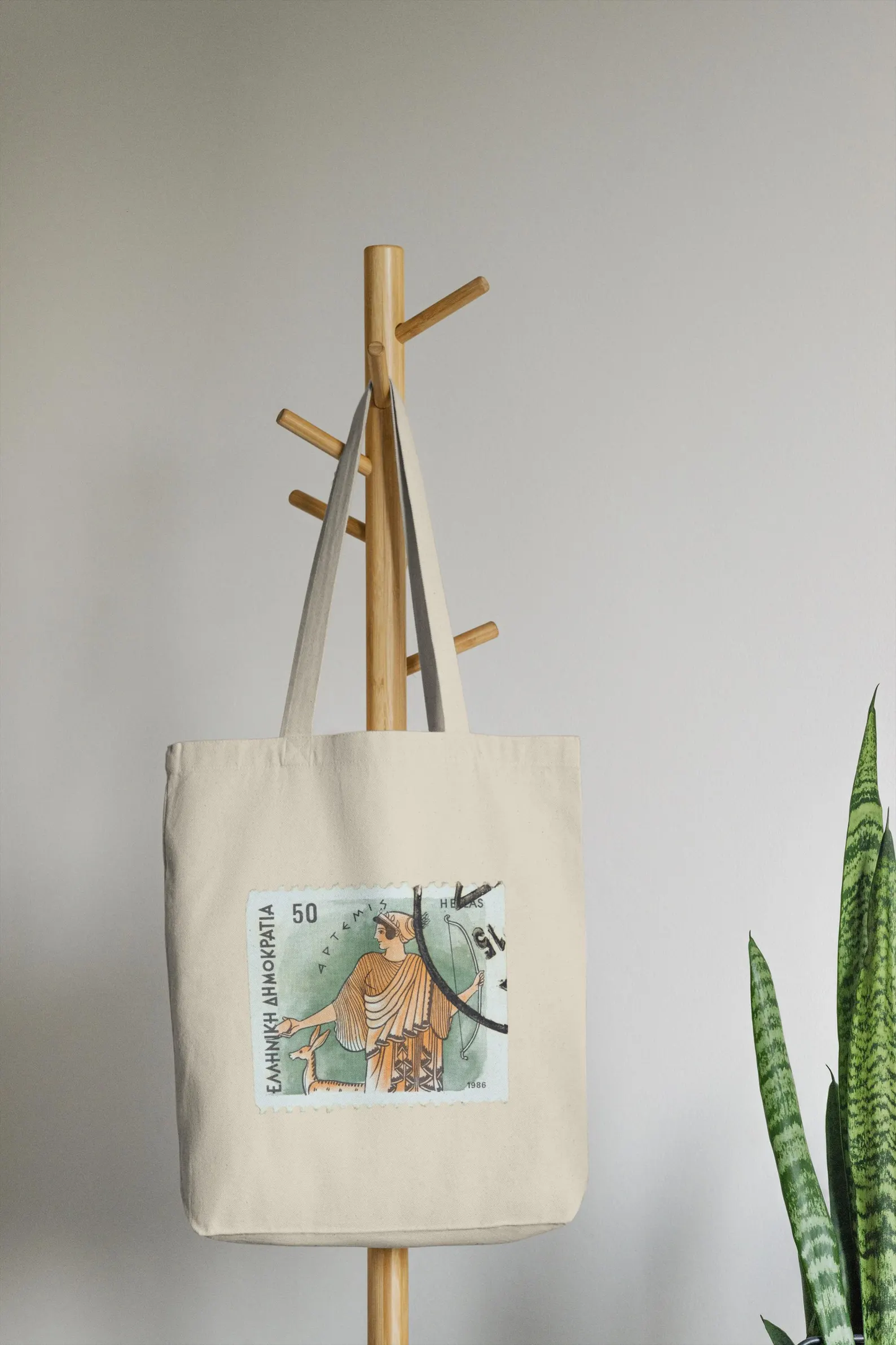 A zoomed-in image of the tote's strong stitching and cotton canvas handles, perfect for daily use. Sea Sun Stories bags combine greek mythology themes and eco-conscious quality, making this a thoughtful option for anyone searching for vintage greek stamp tote bags.