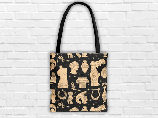 Bag inspired by ancient Greek art, with a collection of Greek statues the Aphrodite to Milos, the owl, the winged victory, with a black handle designed by Sea Sun Stories