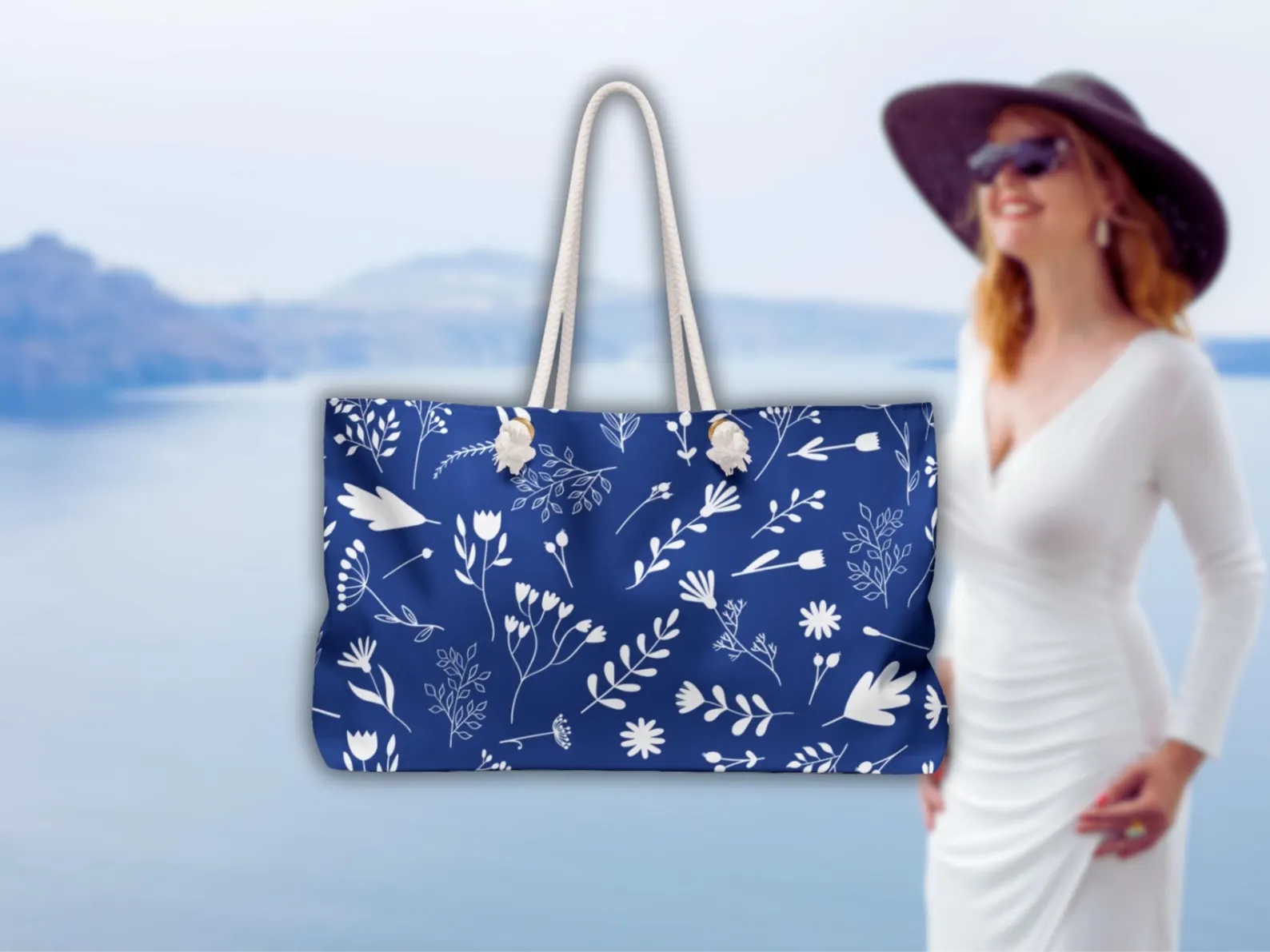 Captured in a travel setting, this large tote bag is styled for day trips and summer vacations. Whether used as a stylish beach bag or a weekend bag for Greece, this blue white bag holds everything needed for a memorable journey. A practical Greek travel accessory by Sea Sun Stories.