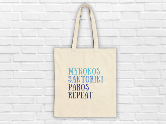A Greek tote bag showing the most popular Greek islands of the Cyclades with the quote: Mykonos Santorini Paros Repeat a great summer accessory for traveling to Greece designed by Sea Sun Stories