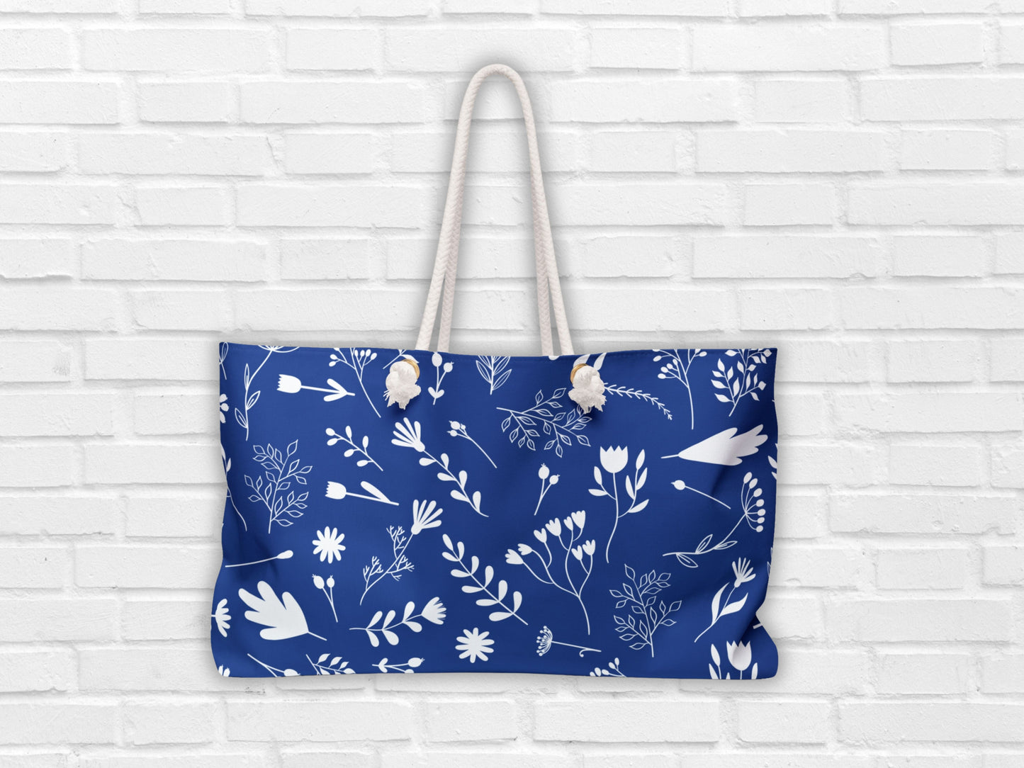 This image showcases the blue and white tote from Sea Sun Stories, highlighting the thick nautical-style rope handles. A great bag for the beach or as a travel tote for women, this large blue bag reflects the charm of Greek coastal living while offering modern functionality.