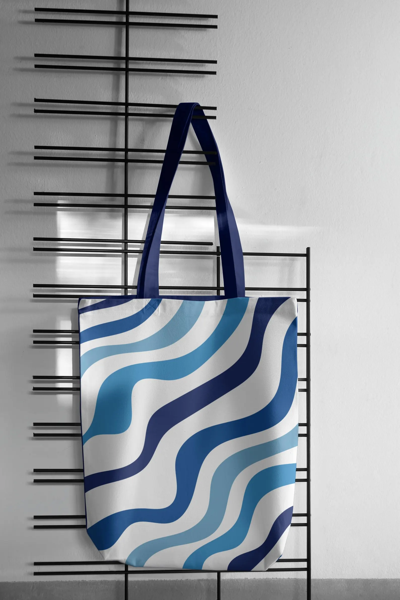 The Blue Aesthetic Tote Bag presented as a gift, perhaps wrapped with a ribbon. This image emphasizes its appeal as a gift for her. The elegant blue and white design and practical features make it a thoughtful and stylish present. This image highlights the bag's unique design and high-quality construction, making it a memorable and cherished gift.