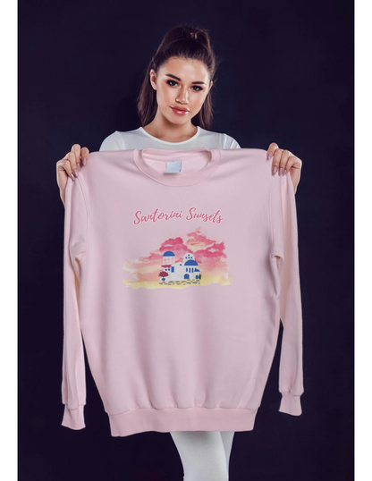 A model holding the Vacation sweater  in light pink, layered with other clothing, illustrating its adaptability for different looks.