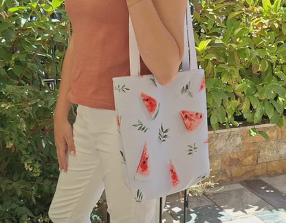 the Watermelon Bag highlighting the vibrant watermelon design, durable construction, and how it looks when carried. The video emphasizes the bag's practicality as a reusable shopping bag and its stylish appeal as a summer tote bag. The watermelon design is fun and fashionable, making it a perfect gift for her. This fruit bag with watermelons is ideal for everyday use.