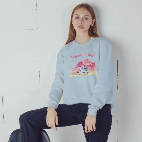 Short video showcasing the details of the Santorini sunset sweatshirt, including the watercolor graphic, fabric texture, and how it looks when worn.